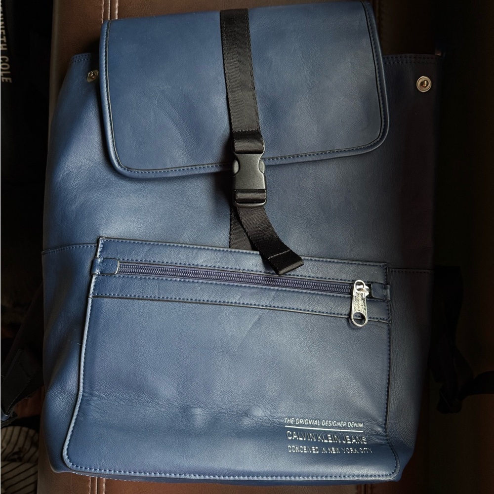 Leather Calvin Klein Blue Backpack with Silver Hardware and Black Straps